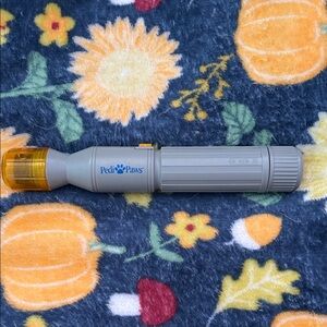 Gray and Orange Dog Nail Grinder